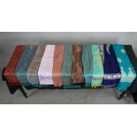 Eleven assorted vintage pashmina patterned scarves.