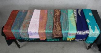 Eleven assorted vintage pashmina patterned scarves.