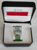 A new in box Eon fashion watch with Jade bead elastic bracelet and blue mother of pearl face. Box