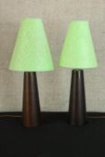 A pair of contemporary black conical ceramic table lamps with green fabric shades. H.80cm. (each).