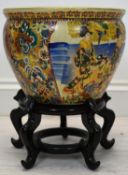 A contemporary Chinese porcelain 'fish bowl' jardindere decorated with ladies by a river, marks to
