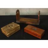 A 19th century mahogany and brass book slide, together with a cased hydrometer and a carved box. H.