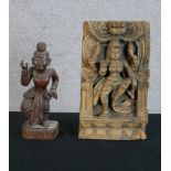 A 20th century Indian hardwood panel carved with a godess together with a carved Balinese hardwood