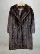 A ladies vintage brown fur ladies full length jacket. H.110 W.60