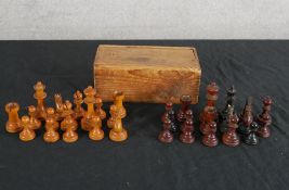 A matching and complete vintage boxwood chess set H.7 W.19 D.10cm