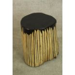 A contemporary painted pine 'tree stump' stool. H.39cm.