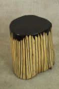 A contemporary painted pine 'tree stump' stool. H.39cm.