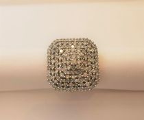 A diamond and 9 carat yellow gold square cluster ring, set with 159 single cut diamonds in open back