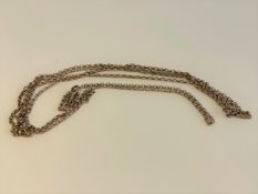 A 9 carat yellow gold round link long watch chain with albert clasp. Weight 18.03g. (Chain broken)