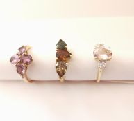 Three 20th century 10 carat gold gem-set rings: a flanked solitaire Morganite ring, a three stone
