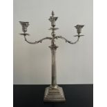 A weighted large three branch sterling silver candelabra with classical form, scrolling foliate arms