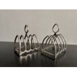 A pair of Art Deco arch shaped small silver toast racks. Hallmarked: William Suckling Ltd, 1926,