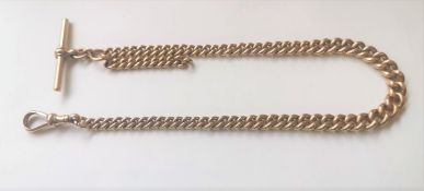 A 9 carat solid rose gold Albert chain with T-bar. All links stamped 375 and graduated in size.