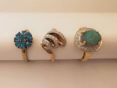 Three 20th century 9 carat yellow gold gem-set rings: a sugar treated opal and diamond cluster ring,