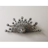 A Victorian convertible old mine diamond, silver and yellow metal sunburst brooch. Set to centre