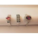 Three 20th century 9 carat white gold gem-set rings: a tourmaline and diamond cluster ring, a