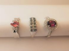 Three 20th century 9 carat white gold gem-set rings: a tourmaline and diamond cluster ring, a