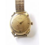 A gold plated Butex swiss automatic antimagnetic gentleman's wrist watch with stretch strap. (Not