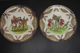 A pair of Royal Doulton seriesware plates depicting scenes after Hugh Thomson, marks verso. Dia.26.