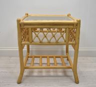 A contemporary bamboo framed glass topped conservatory table. H.59 W.51 D.51cm
