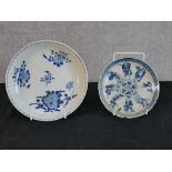 A 19th century Chinese blue and white porcelain saucer dish, decroated with panels of flowers bering