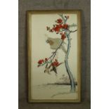 A 20th century Japanese silk embroidered picture of a cockatoo sitting in a red blossom tree with
