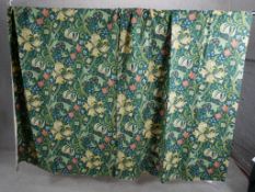 A pair of William Morris design 'Golden Lilly' pattern curtains. H.188 W.117cm