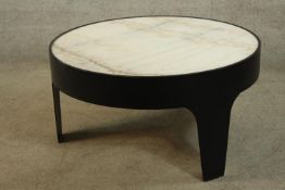 A contemporary white veined marble topped and metal low circular occasional table. H.46 Dia.90cm.
