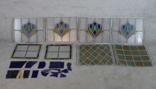 A collection of eight stained glass window panels, and the remains of another. Largest H.36 x W.