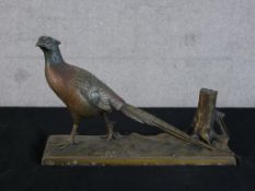 A late 19th/early 20th century Austrian cold painted bronze figure of a pheasant standing by the
