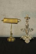 An early 20th century brass desk light together with a 20th century silver plated table lamp
