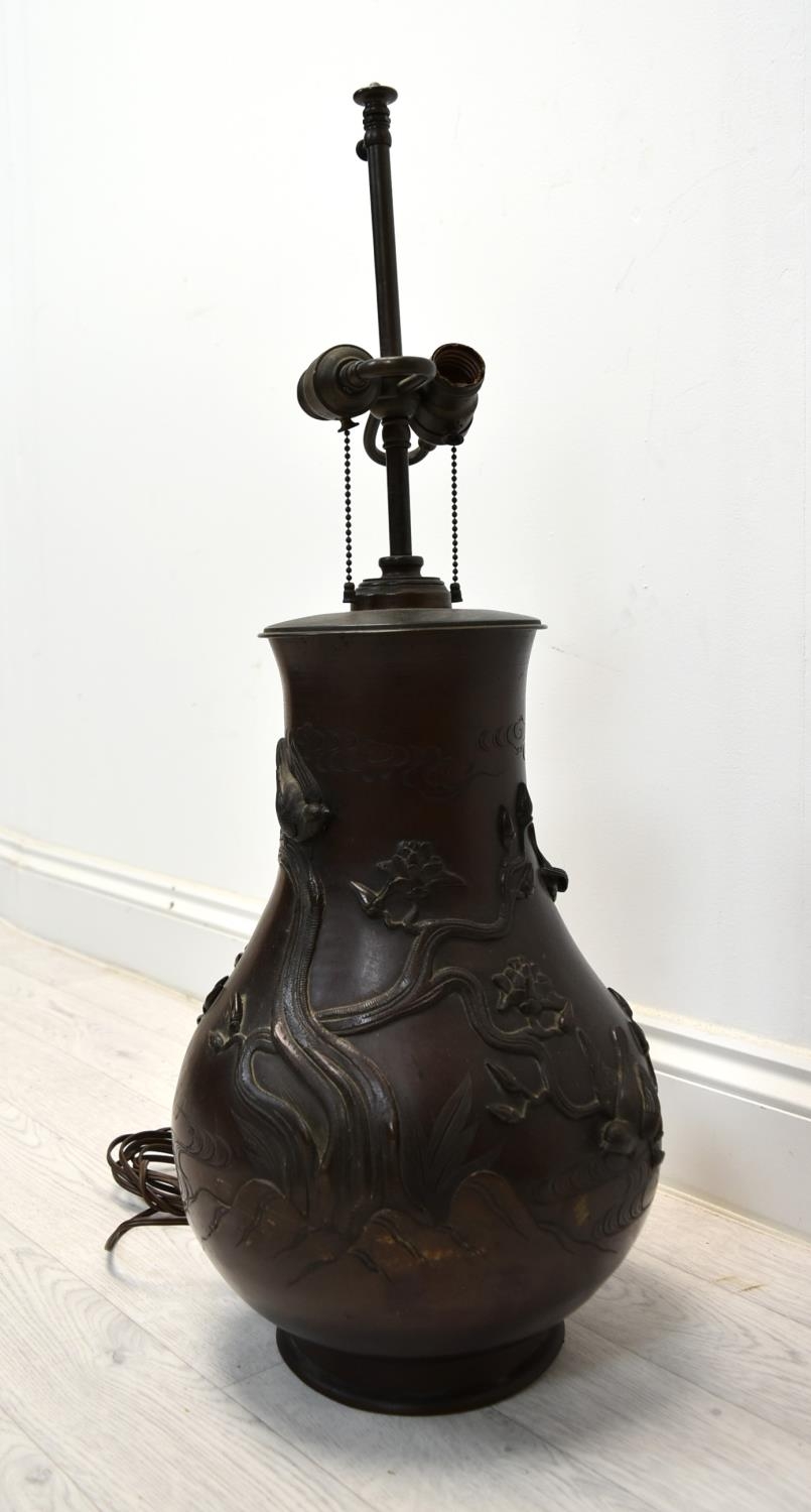 A Japanese Meiji period (1852-1912) bronze baluster vase cast with bird decoration (converted to a - Image 3 of 8