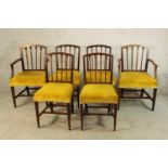 A set of six 19th century mahogany framed shaped spindle back dining chairs raised on tapering