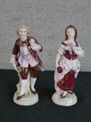 A pair of early 20th century German porcelain figures of a man and his female companion, each