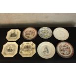 Eight assorted Victorian painted pottery plates, some of commemorative interest. Dia.28cm. (largest)