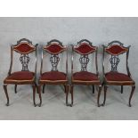 A set of four late 19th/early 20th century mahogany show framed and pierced splatback dining