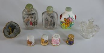 Two Chinese painted glass snuff bottles and stoppers, a Chinese porcelain snuff bottle and