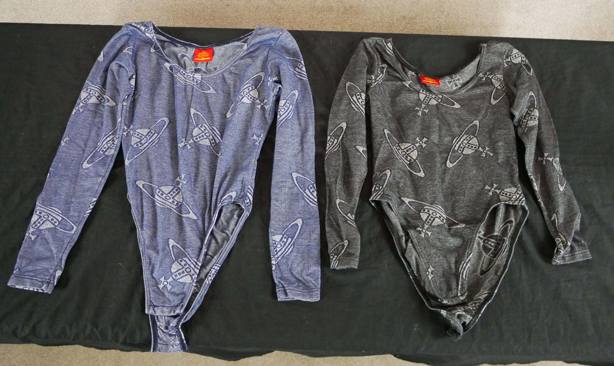 Two 20th century ladies Vivenne Westwood leotards, each decorated with the Vivenne Westwood motif.