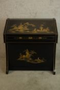 A 20th century lacquered chinoiserie fall front drinks cabinet, opening to reveal fitted interior,