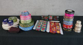 A large collection of Danish embroidered silk folk costume ribbon, different colours, designs and