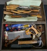 An early 20th century folding toolbox together with a large selection of manual tools. H.12 W.50 D.
