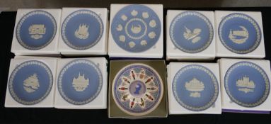 Nine boxed Wedgewood blue Jasperware plates together one other Wedgwood collectors plate. W.28 D.