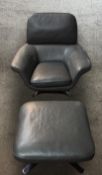 A modern grey leather Minotti Blake armchair with matching footstool. H.90 W.93cm. (largest)