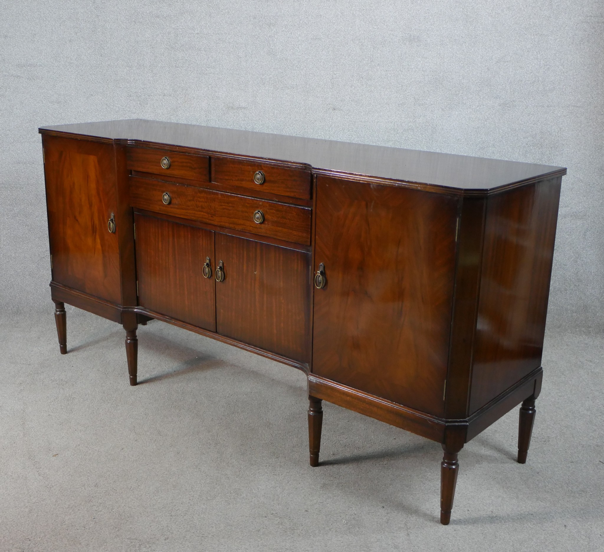 A 20th century Strongbow mahogany inverted breakfront sideboard with two short over single long - Image 6 of 6
