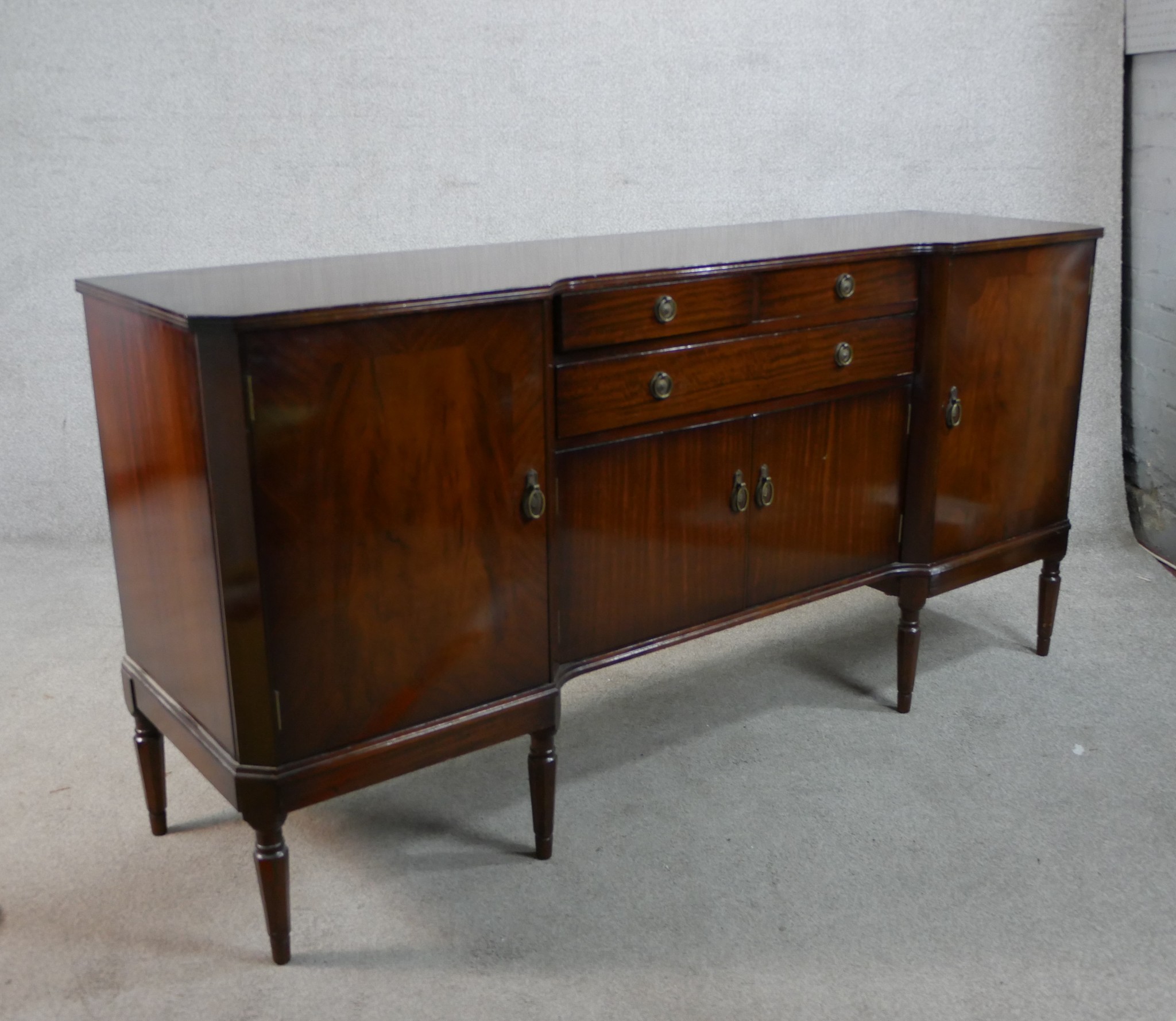 A 20th century Strongbow mahogany inverted breakfront sideboard with two short over single long - Image 5 of 6