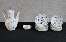 A Royal Copenhagen blue and white fluted porcelain part coffee set each with painted and impressed