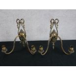 A pair of 19th century brass twin branch wall mounted light fittings (converted to electricity) H.27