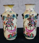 A pair of late 19th century Japanese Satuma crackle glaze pottery vases with twin moulded handles