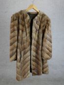 A ladies vintage brown fur ladies short jacket. H.83 W.50cm