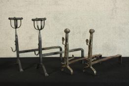 Two pairs of 17th century style iron firedogs. H.48cm. (largest)